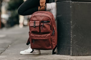 Brown backpack on street corner