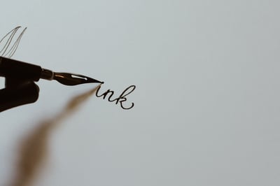fountain pen closeup writing in cursive