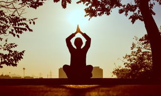 Person holding yoga position 